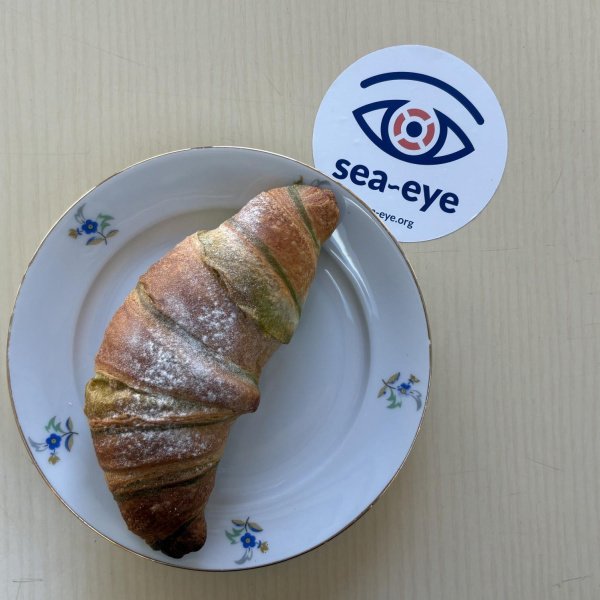 Ein Croissant für die Menschlichkeit